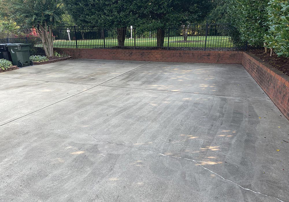 concrete driveway pressure washing before